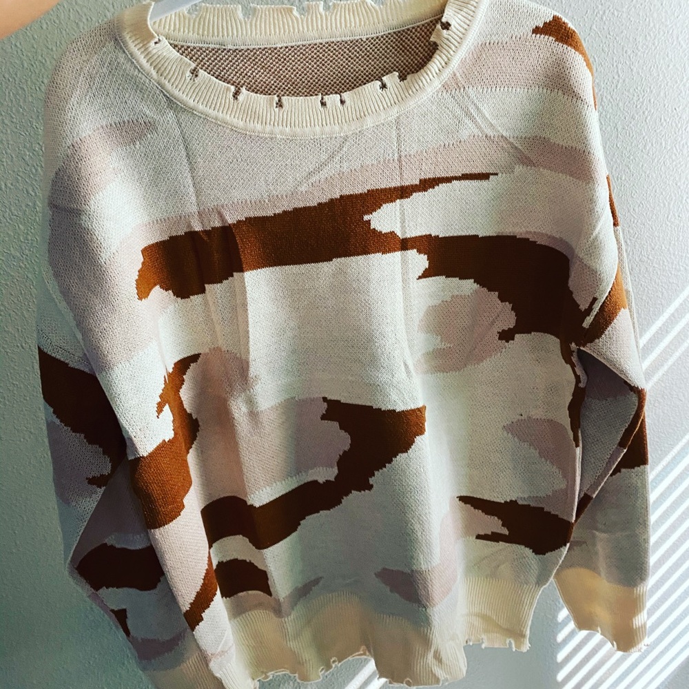 Distressed sweater